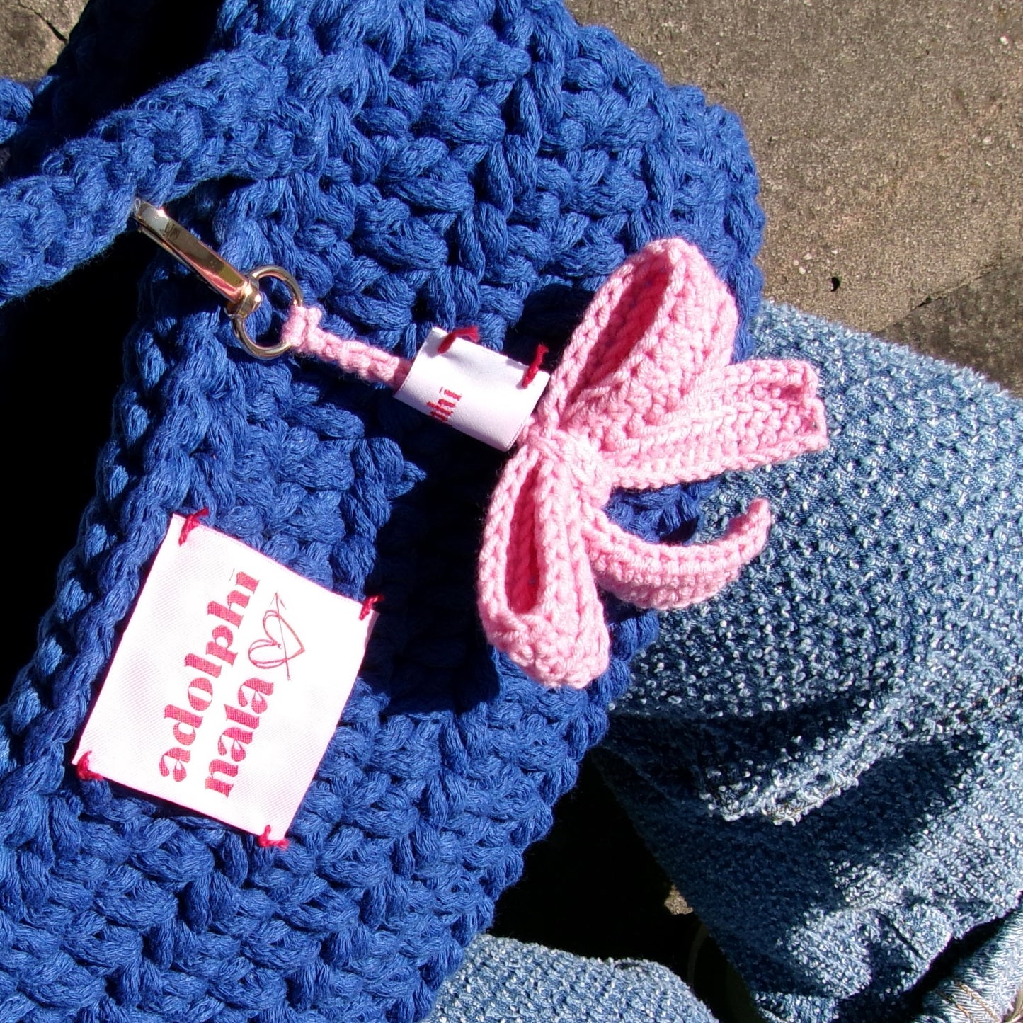 SKLADEM: mašle bag charm